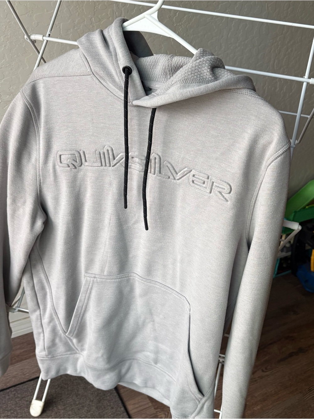Quiksilver Light Gray Embossed Logo Hoodie with Black Drawstrings